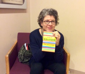 Photo by Christina Cardona Meg Wolitzer holding a copy of her latest book titled "The Interestings"