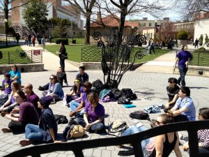 Photo Courtesy of GLASA On April 17, GLASA and students participated in "Day of Silence" by wearing purple and covering their mouths with masking tape in Klapper Circle .