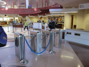 Photo Credit: Aliza Chasan The new turnstile system has been slowing students in need of the library down.