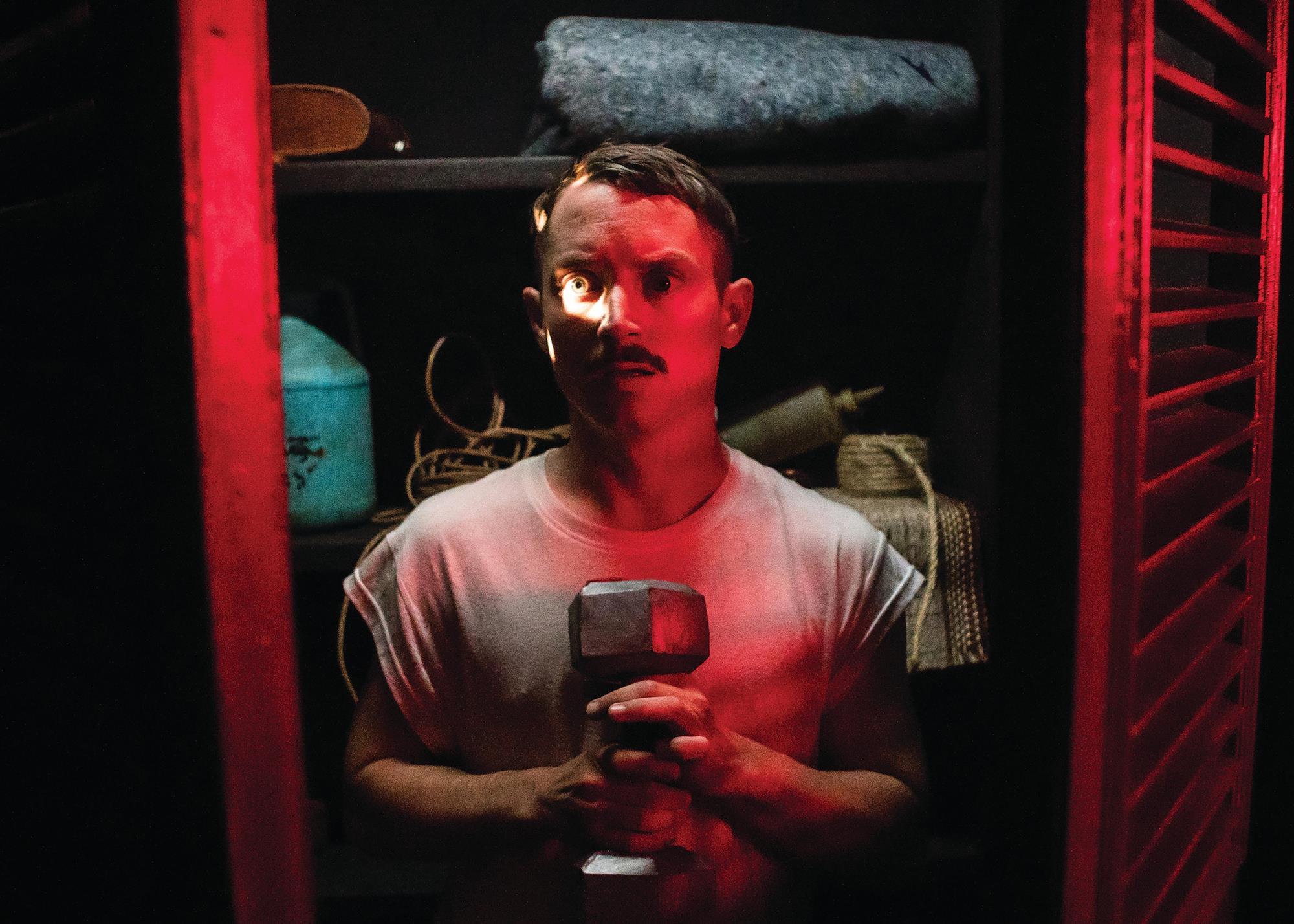 Caption: Elijah Wood Is Hilarious In Bloody Father-Son Comedy Photo Credit:https://www.indiewire.com